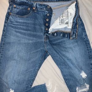Levi’s 501 distressed jeans